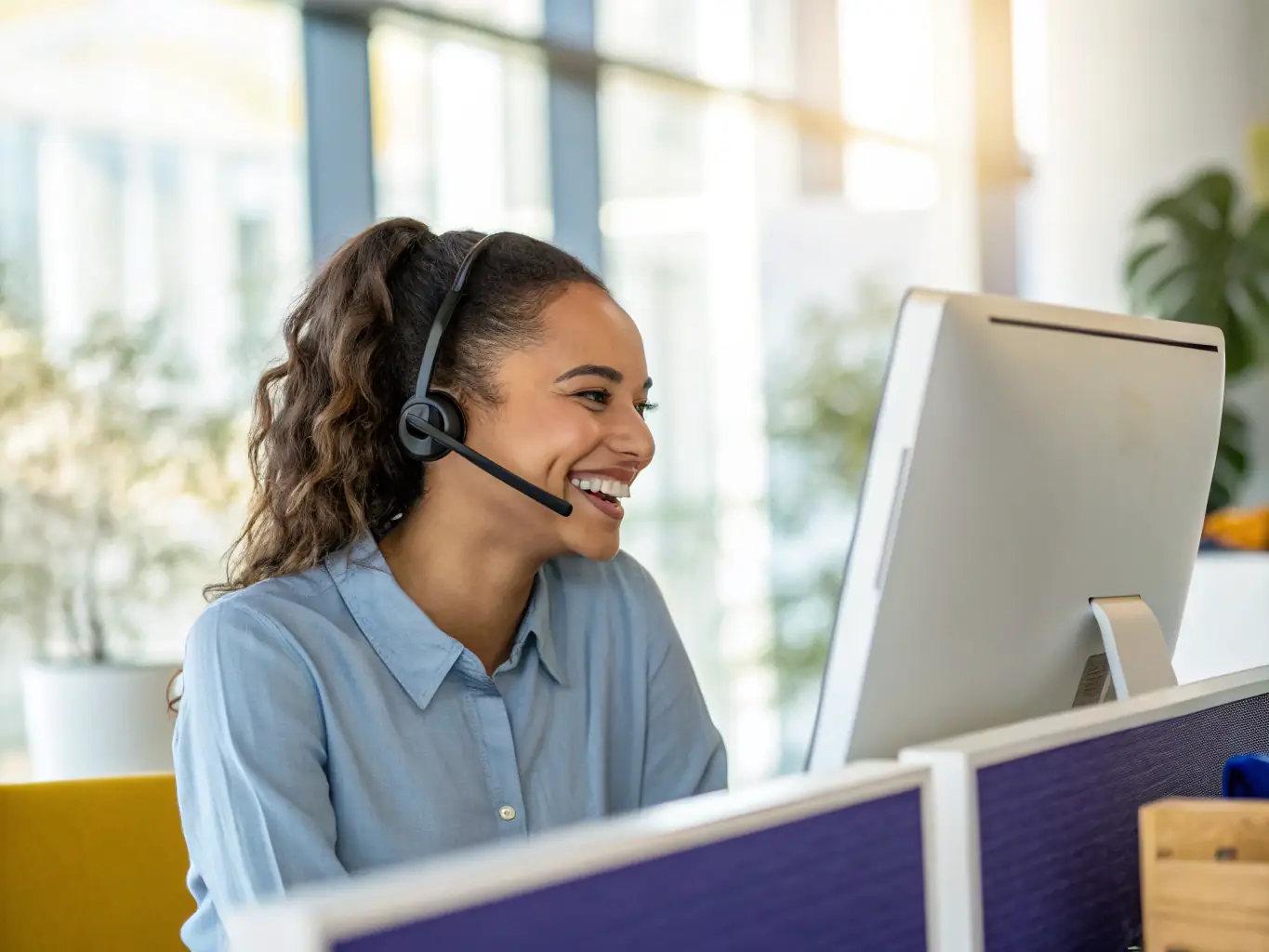 A dedicated customer service representative assisting a government official with a bulk order, highlighting the personalized support and streamlined ordering process offered by Office1Stop.